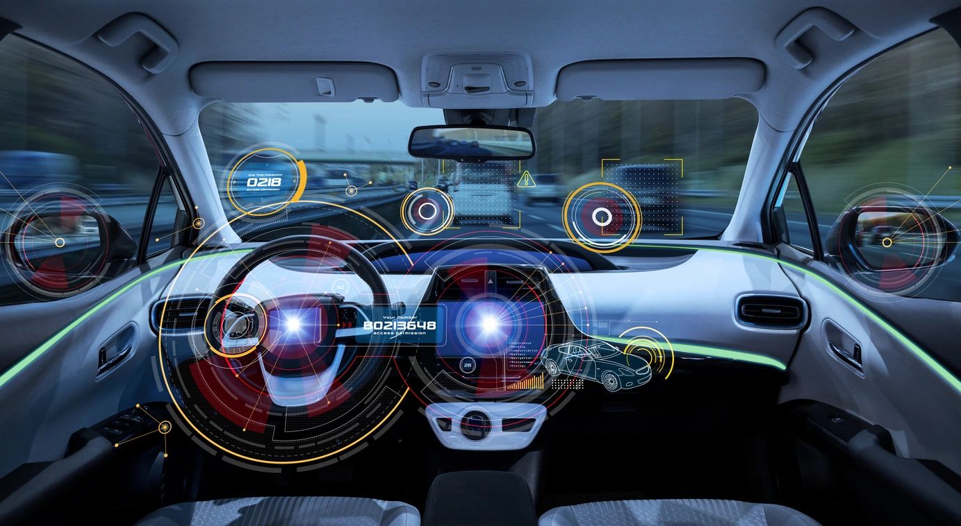 fm=f_yra0KDP A car dashboard with the steering wheel and dashboard lights.